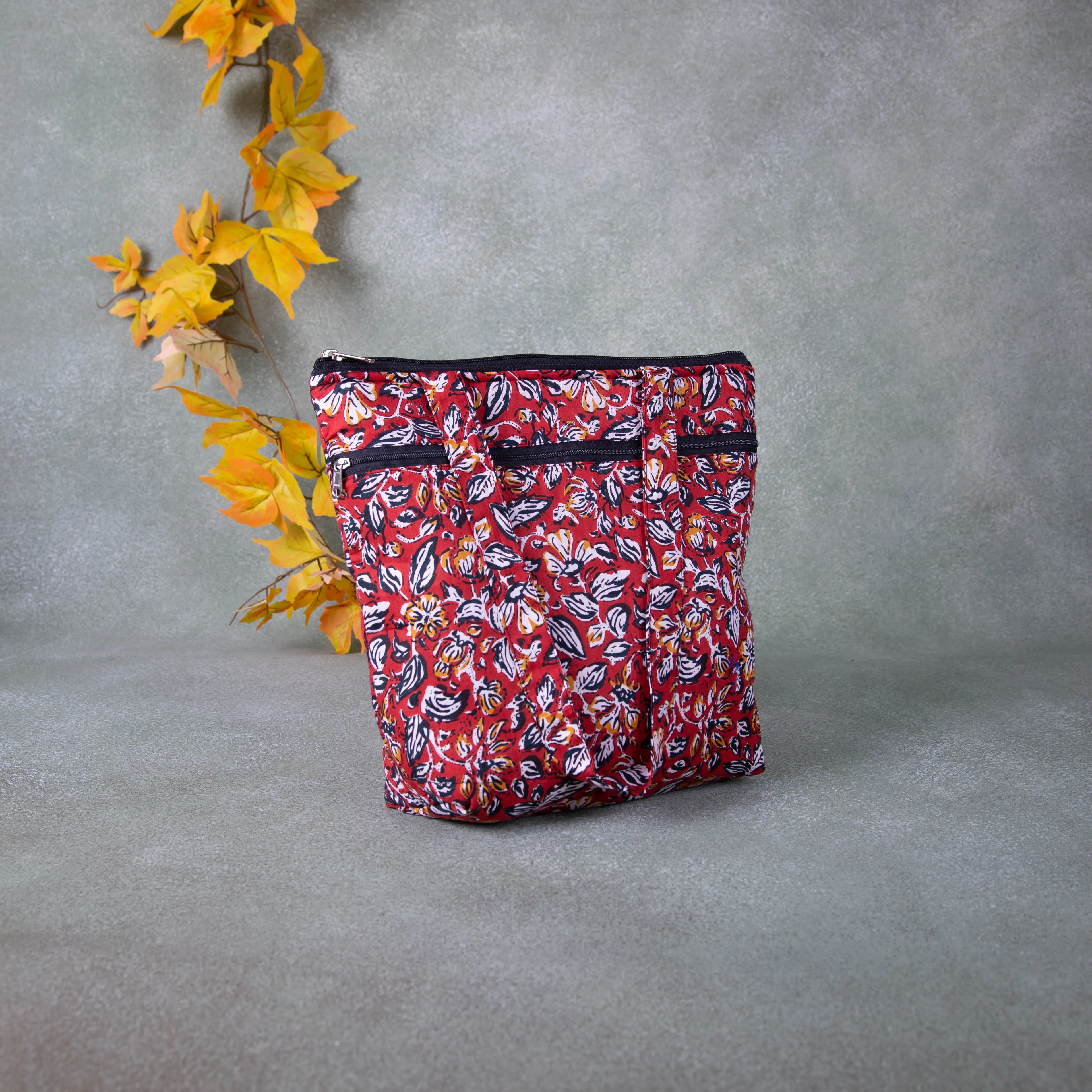 Medium Size Handbag Brown Colour with Leaf Design.